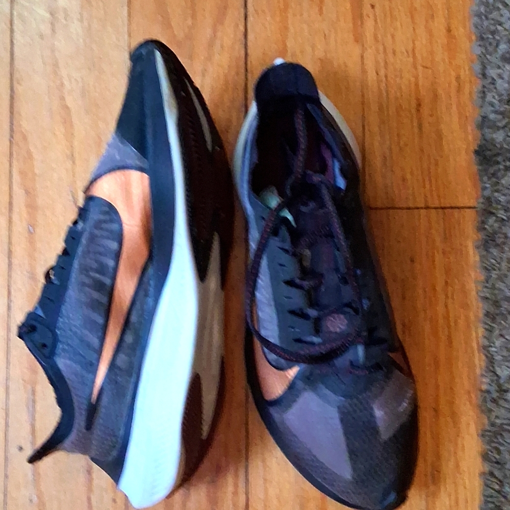 Nike Black and Brown Athletic Shoes with Mesh Design